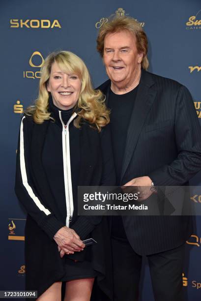 Donnice Pierce and Howard Carpendale attend the Goldene Henne awards 2023 at Media City on October 13, 2023 in Leipzig, Germany.
