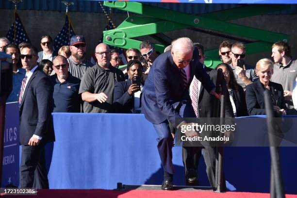 President Joe Biden trips and falls prior to his remarks on Israel in Philadelphia, Pennsylvania, United States on October 13, 2023.