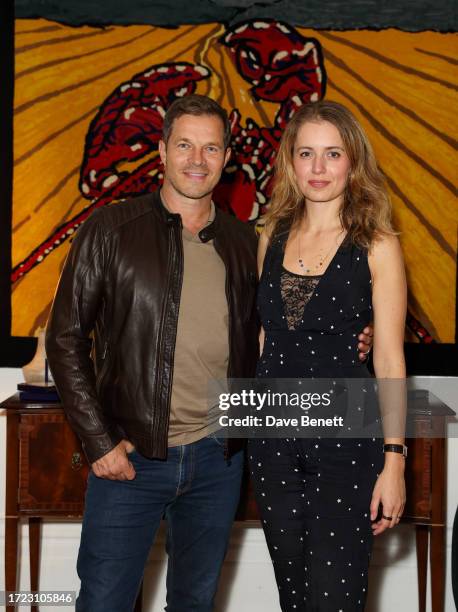 Paul Sculfor and Federica Amati attend the new ROMY Zodiac Collection event on October 13, 2023 in London, England.