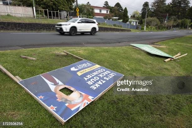 Vandalized and disfigured election hoardings lie on the road side in Glen Eden, Auckland, New Zealand on October 13, 2023. New Zealanders go to the...