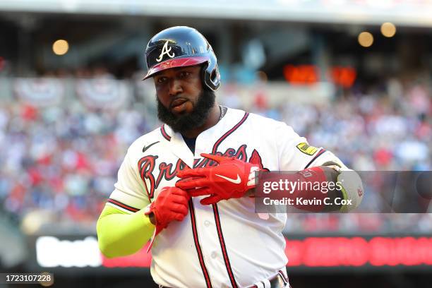Marcell Ozuna of the Atlanta Braves looks on during the second inning against the Philadelphia Phillies during Game One of the Division Series at...
