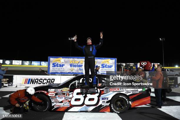 Dylan Cappello Ford Mustang climbs onto his car in victory lane to celebrate winning the race during the ARCA Menards Series West Star Nursery 150 on...
