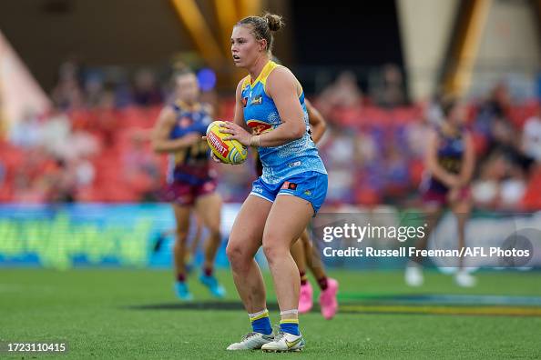 Karl Rowbottom Charlie Rowbottom of the Suns in action during the 2023 AFLW Round 07 ...