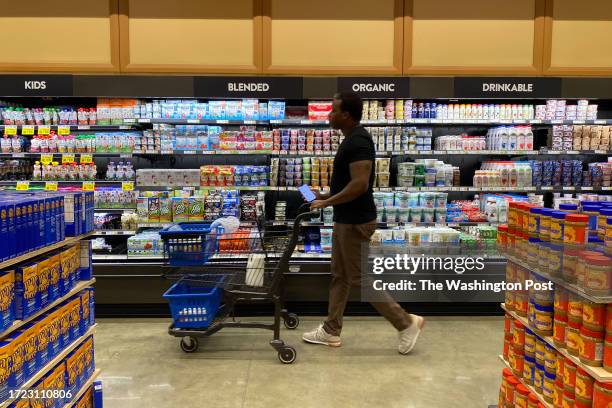 Eugene shops inside of a Wegmans to fulfill an instacart order in Washington, DC on October 07, 2023.