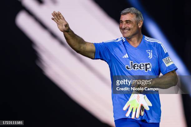 Angelo Peruzzi gestures as he enters the pitch during the'Together, a Black & White Show' event organized by Juventus FC as part of the celebrations...