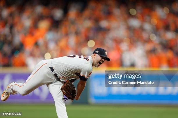 Ryan Pressly of the Houston Astros pitches during the ninth inning against the Minnesota Twins during Game One of the Division Series at Minute Maid...