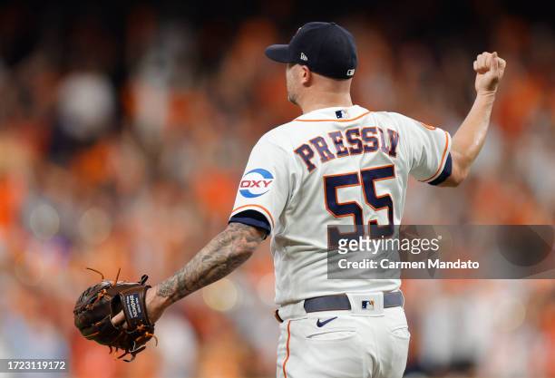 Ryan Pressly of the Houston Astros reacts after a strikeout during the ninth inning against the Minnesota Twins during Game One of the Division...