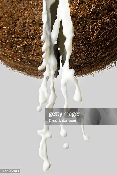 coconut with milk - kokosmelk stockfoto's en -beelden