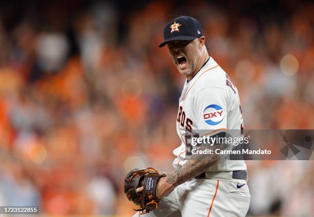 Ryan Pressly of the Houston Astros reacts after a strikeout during the ninth inning against the Minnesota Twins during Game One of the Division...