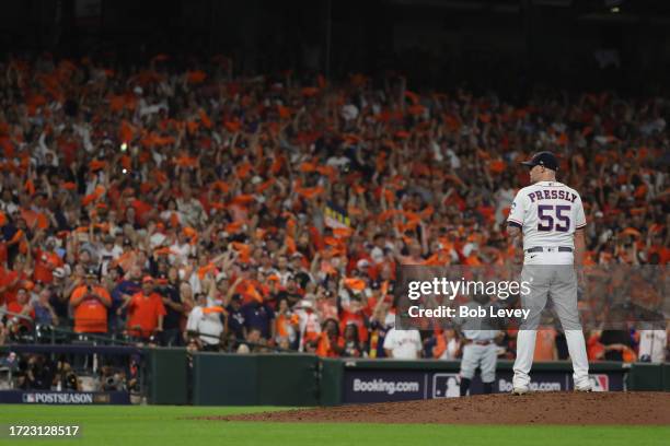 Ryan Pressly of the Houston Astros pitches during the ninth inning against the Minnesota Twins during Game One of the Division Series at Minute Maid...