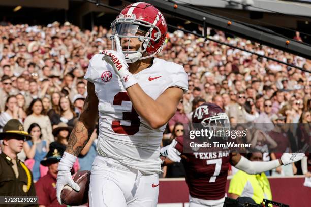 Jermaine Burton of the Alabama Crimson Tide reacts after a touchdown in the second half against the Texas A&M Aggies at Kyle Field on October 07,...