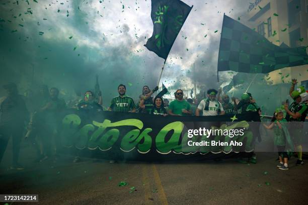 Fans and members of the Austin FC supporters group March to the Match before the MLS match between Austin FC and Los Angeles FC at Q2 Stadium on...