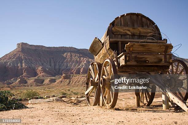 wagon with mesa out west - wagon wheel stock pictures, royalty-free photos & images