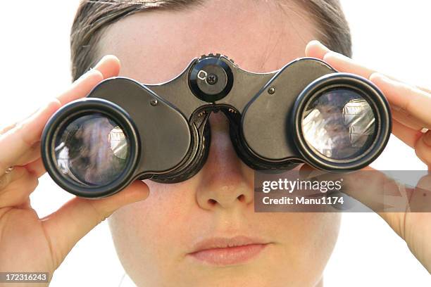 woman looking with binoculars - head forward white background stock pictures, royalty-free photos & images