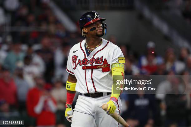 Ronald Acuna Jr. #13 of the Atlanta Braves reacts after striking out during the fifth inning against the Philadelphia Phillies during Game One of the...