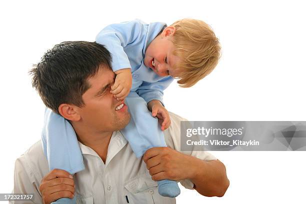 father's love - pinching nose stockfoto's en -beelden