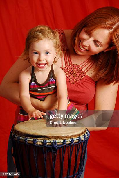 felice little drummer - bongo foto e immagini stock