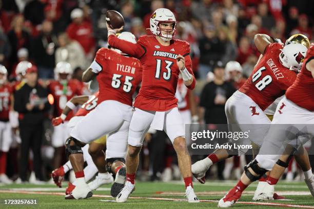 Jack Plummer of Louisville Cardinals runs with the ball against the Notre Dame Fighting Irish at L&N Stadium on October 07, 2023 in Louisville,...