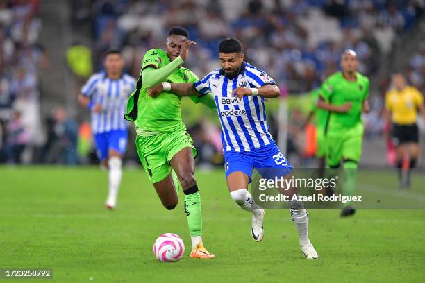 Rodrigo Aguirre of Monterrey fights for the ball with Moisés Castillo of Juárez during the 12th round match between Monterrey and FC Juarez as part...
