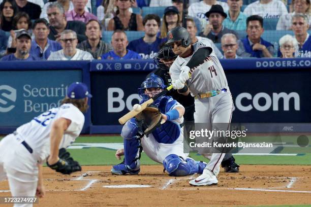 Gabriel Moreno of the Arizona Diamondbacks hits a home run off Clayton Kershaw of the Los Angeles Dodgers in the first inning during Game One of the...
