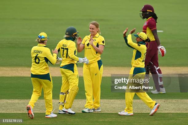 Australia celebrate a wicket during game one of the One Day International series between Australia and the West Indies at Allan Border Field on...