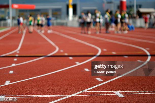track and field (warm up) - relay race start line stock pictures, royalty-free photos & images