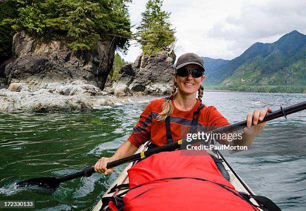 woman kayaking in canada - sea kayak stock pictures, royalty-free photos & images