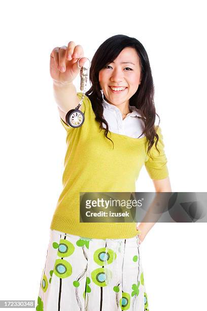 young woman holding keys - car keys on white stock pictures, royalty-free photos & images
