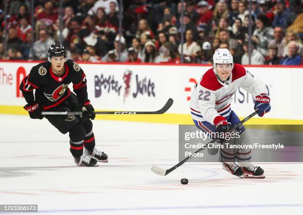 Cole Caufield of the Montreal Canadiens skates with the puck up the ice in the third period of a preseason game against the Ottawa Senators at...