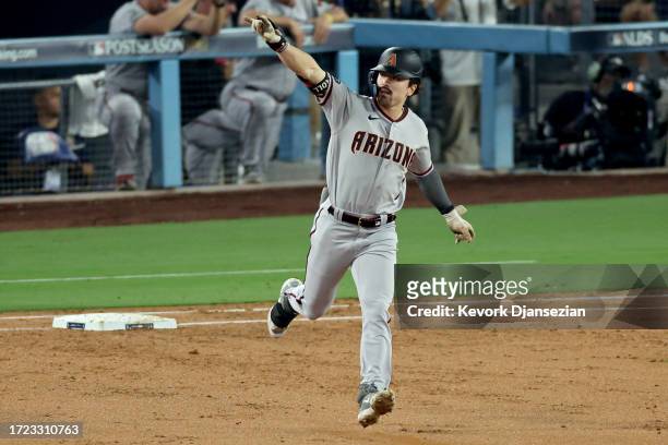 Corbin Carroll of the Arizona Diamondbacks rounds the bases after hitting a home run in the second inning against the Los Angeles Dodgers during Game...