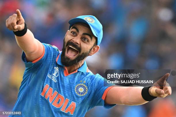 India's Virat Kohli celebrates after the dismissal of Pakistan's Mohammad Rizwan during the 2023 ICC Men's Cricket World Cup one-day international...