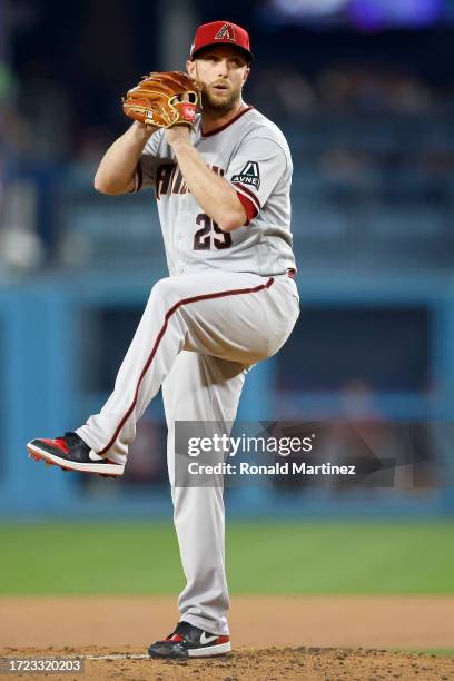 Merrill Kelly of the Arizona Diamondbacks pitches in the first inning against the Los Angeles Dodgers during Game One of the Division Series at...