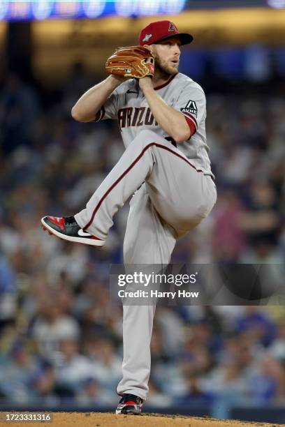 Merrill Kelly of the Arizona Diamondbacks pitches in the second inning against the Los Angeles Dodgers during Game One of the Division Series at...