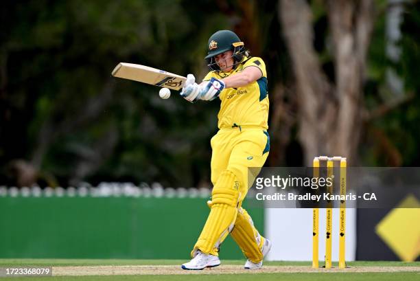 Alyssa Healy of Australia hits the ball to the boundary for a four during game one of the One Day International series between Australia and the West...
