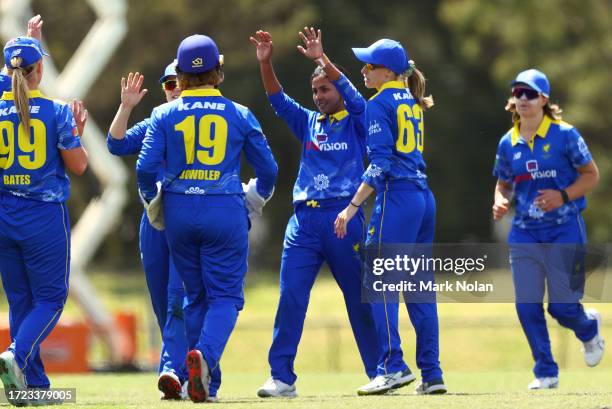 Janutal Sumona of the ACT celebrates a wicket with team mate during the WNCL match between ACT and Tasmania at EPC Solar Park, on October 08 in...