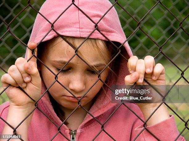 girl behind the fence #2 - suicide stock pictures, royalty-free photos & images