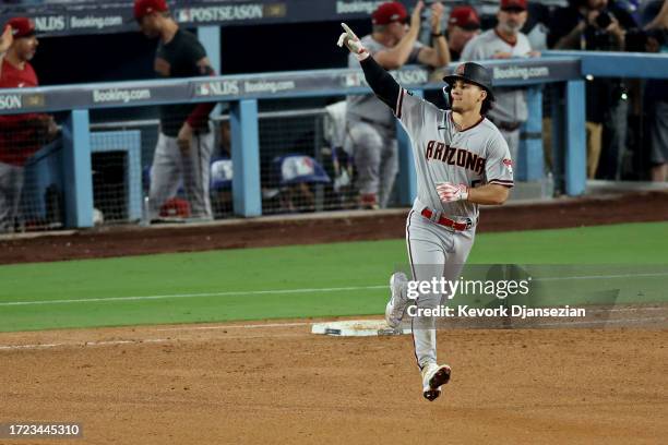 Alek Thomas of the Arizona Diamondbacks rounds the bases after hitting a home run in the seventh inning against the Los Angeles Dodgers during Game...