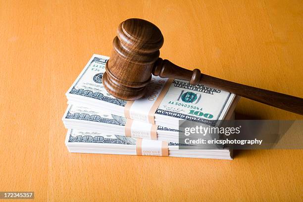 judge gavel on us dollars - punishment stock pictures, royalty-free photos & images