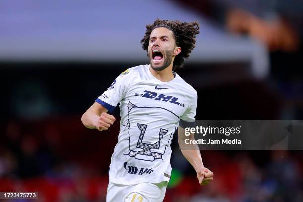 Cesar Huerta of Pumas celebrates after scoring the team's first goal during the 12th round match between Cruz Azul and Pumas UNAM as part of the...
