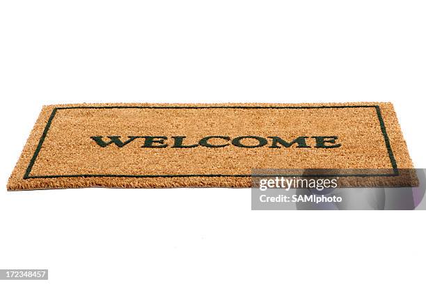 tapis de bienvenue - panneau de bienvenue photos et images de collection