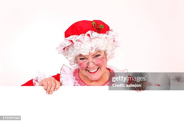 segurando um sinal - mãe natal imagens e fotografias de stock