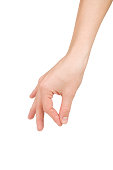 A hand with the index finger and thumb pinching