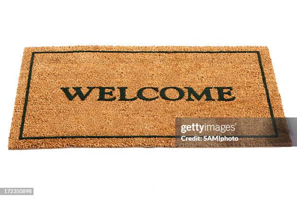 welcome mat - above the threshold stockfoto's en -beelden