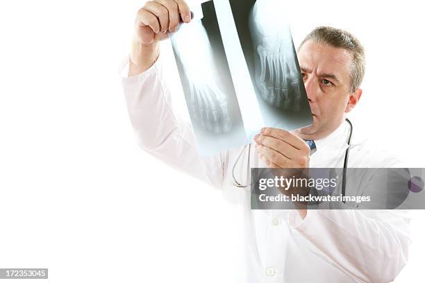 foot exam - high key stock pictures, royalty-free photos & images