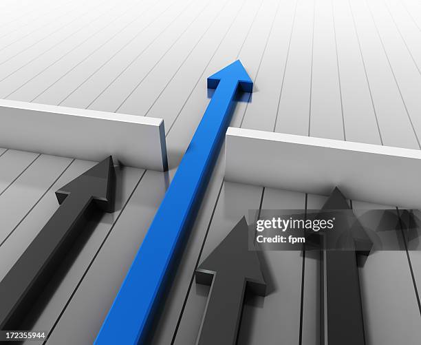 graphic of gray arrows and one blue arrow leading the way - following arrows stock pictures, royalty-free photos & images