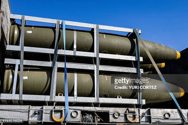 Shipment of 155mm artillery shells used by the Israeli army is transported on a truck along a highway between the Jerusalem and Beersheba in southern...