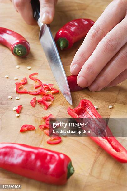 chopping red chilli - slash 2007 stock pictures, royalty-free photos & images