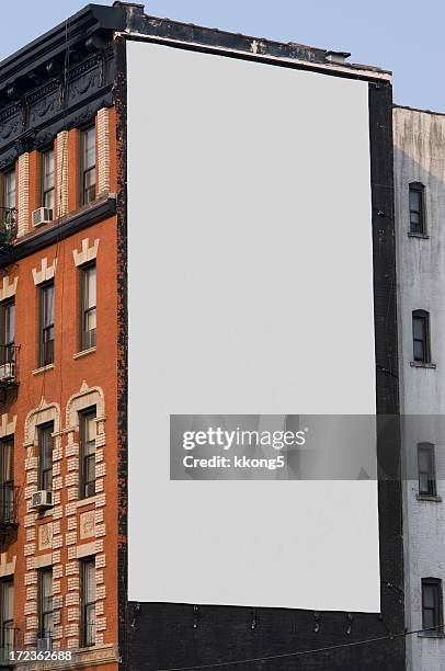 werbung plakat in manhattan, new york - vertikal stock-fotos und bilder