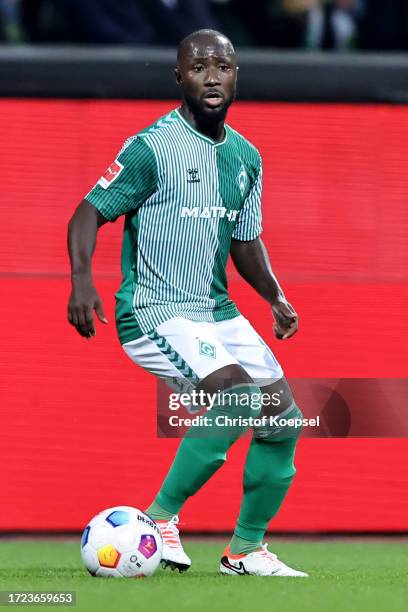 Naby Keita of Werder Bremen runs with the ball during the Bundesliga match between SV Werder Bremen and TSG Hoffenheim at Wohninvest Weserstadion on...