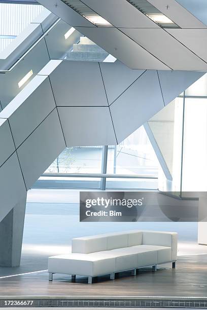 stairs in modern interior, illuminated staircase and sofa - airport stairs stock pictures, royalty-free photos & images